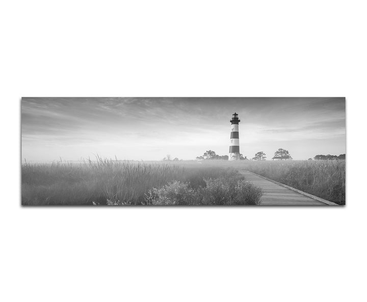 Paul Sinus Art Leinwandfoto als Panorama SCHWARZ/Weiss 150x50cm Wiesen Holzweg Leuchtturm Nebel Herb