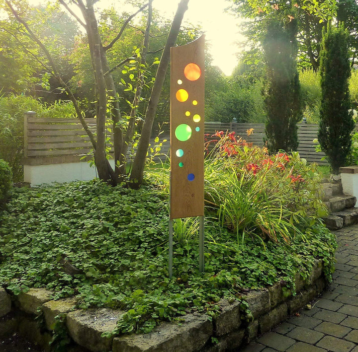 Gartenskulptur aus Holz und Glas. Gartendekoration als Unikate handgefertigt und wetterfest