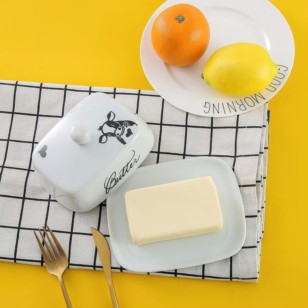 Butterdose mit Griff für 250g Butter, Hochwertige Keramik, Weiss mit Schwarzem Kuhkopfmuster, Porzel