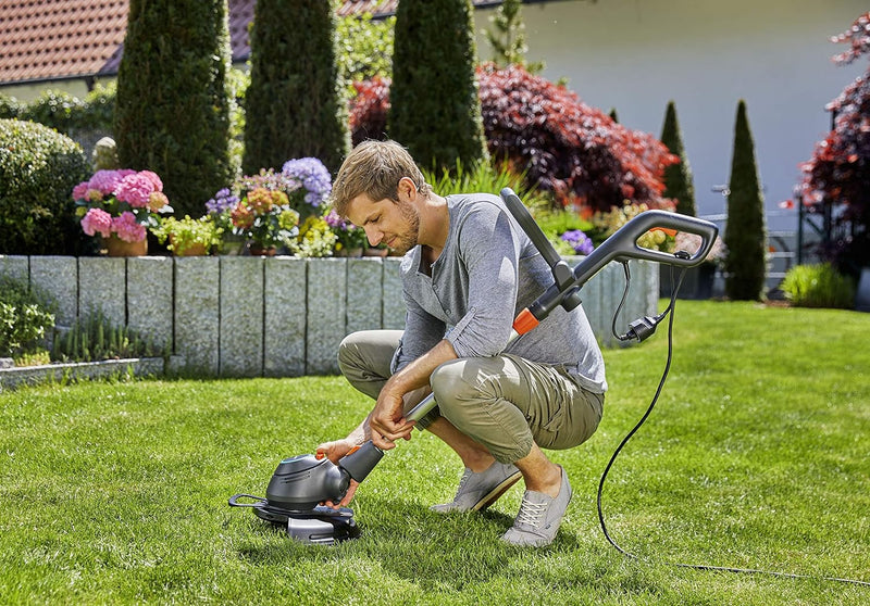 Gardena Elektro-Trimmer ComfortCut 550/28: Rasentrimmer mit verstellbarem Griff, abwinkelbarem sowie