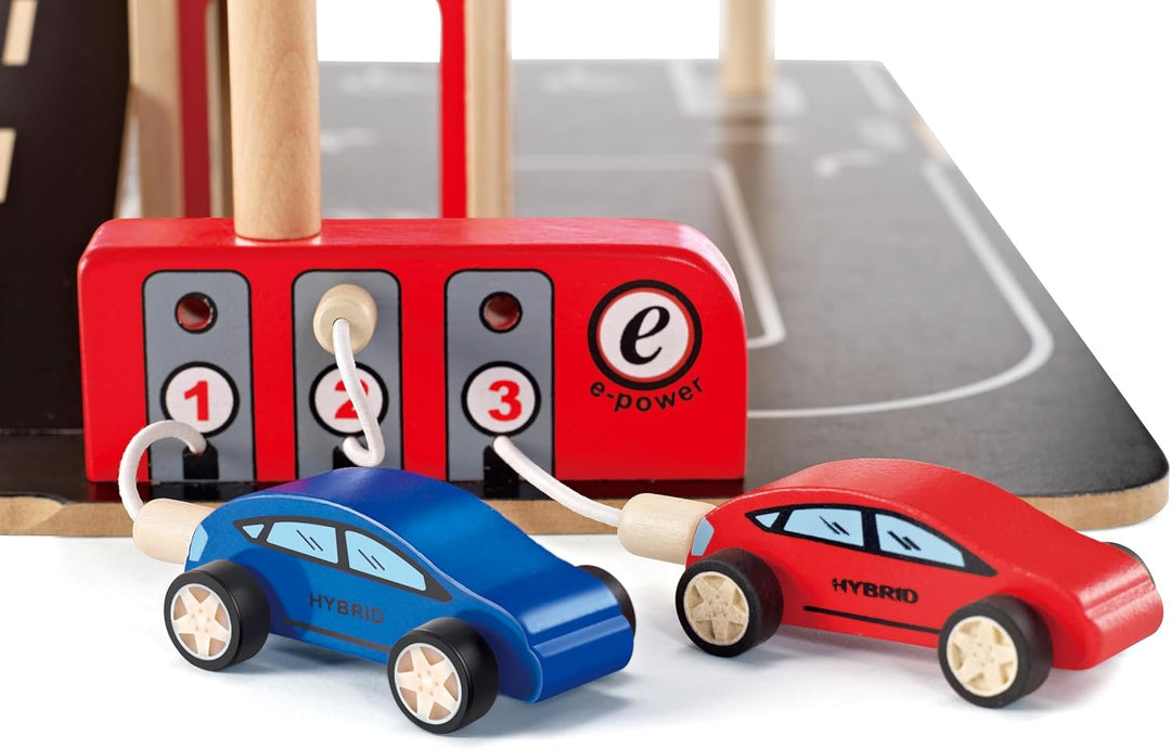 Parkhaus Spielset aus Holz von Hape | Autogarage auf drei Ebenen mit Autos und Hubschrauber