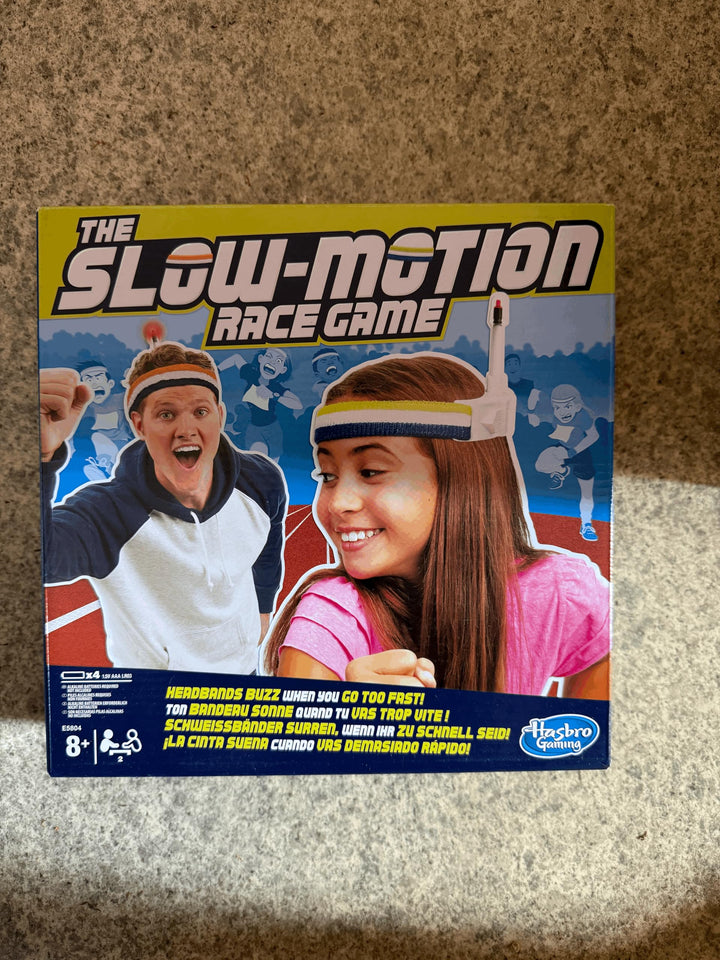 Hasbro Gaming E5804EU4 The Slow Motion Race Game, Partyspiel, mit Langsamkeit zum Sieg, Mehrfarbig
