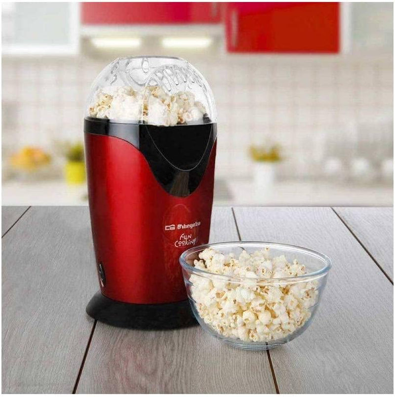 Orbegozo PA 4300 Popcorn, tragbar, ölfrei, Schnellbetrieb, Messtopf, 1000 W, Metallic-Rot