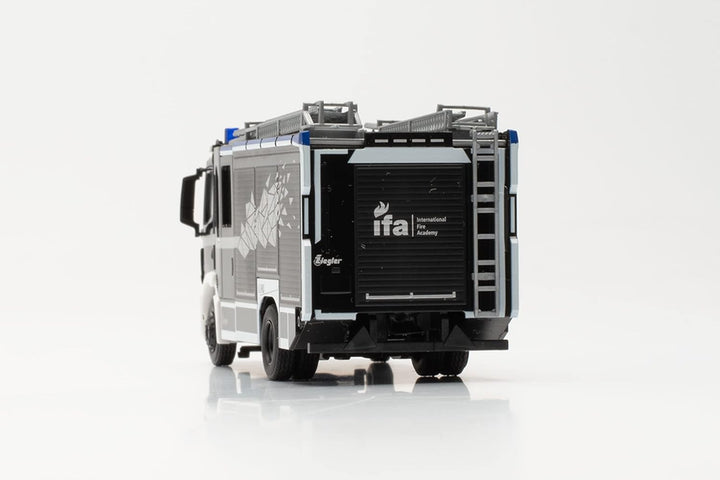 Herpa LKW Modell Man TGM CC Ziegler Z-Cab Interkantonales Feuerwehr-Ausbildungszentr. CH, im Masssta