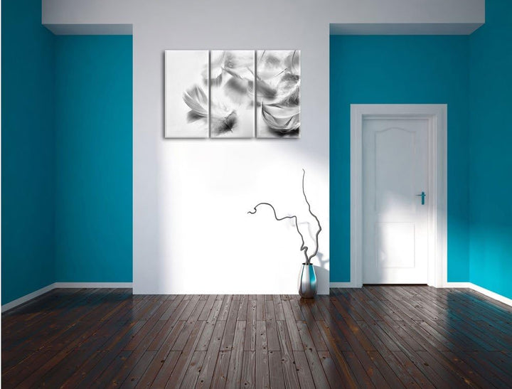 Pixxprint Weisse Feder auf schwarzem Stein als Leinwandbild/Grösse: 3 Teilig (120x80) cm/Wandbild/Ku
