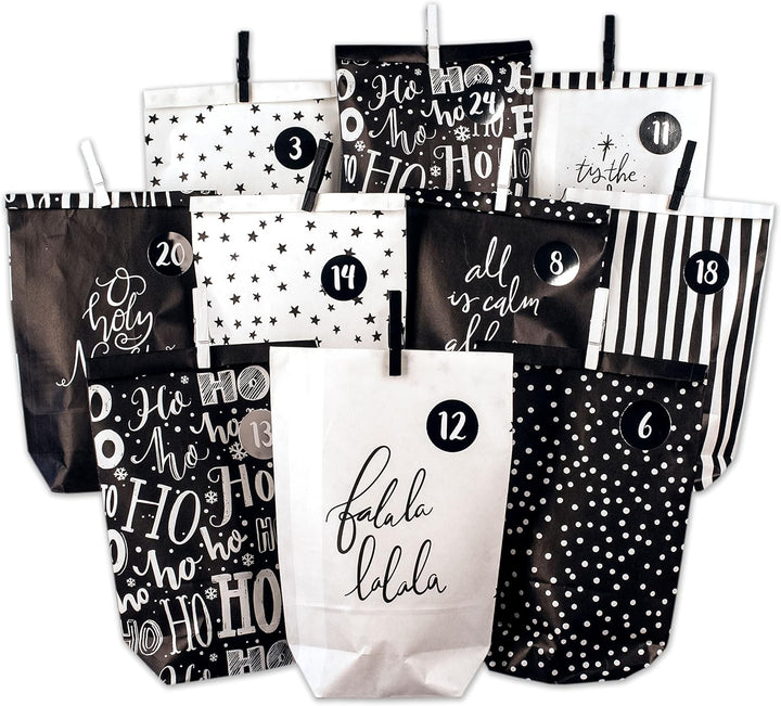 Papierdrachen Adventskalender zum Befüllen - 24 schwarze und weisse bedruckte Geschenktüten und 24 Z