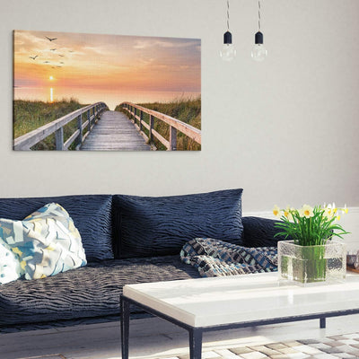 PICANOVA – Bild auf Leinwand Holzweg zum Meer 100x50cm – Leinwandbild – Premium Leinwanddruck – Wand