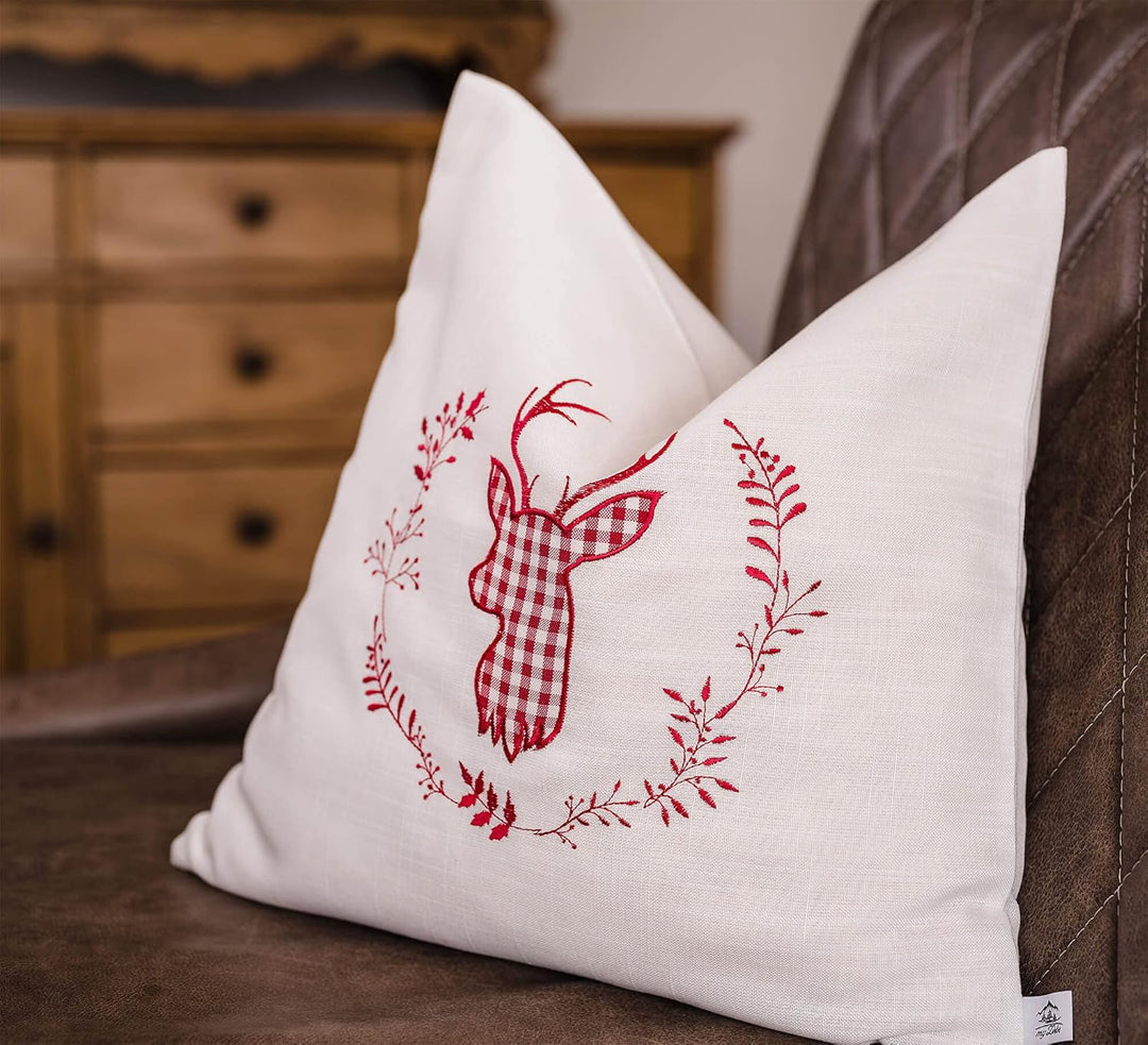 Zirbenkissen beige rot bestickt mit Hirsch Grösse 40x40 cm befüllt mit Zirbenflocken aus Alpen Zirbe
