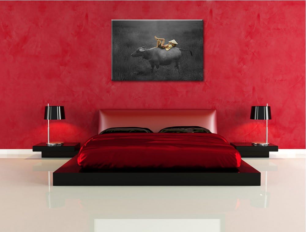liegendes Kind auf Wasserbüffel schwarz/weiss Format: 100x70 auf Leinwand, XXL riesige Bilder fertig