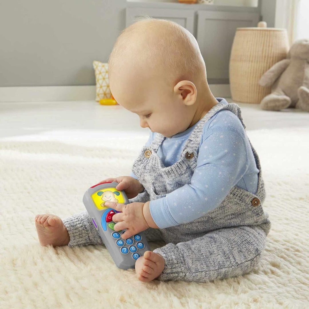 Fisher-Price Lernspass Lernspielzeug für Babys Hündchen-Fernbedienung Spielzeugfernbedienung mit Mus