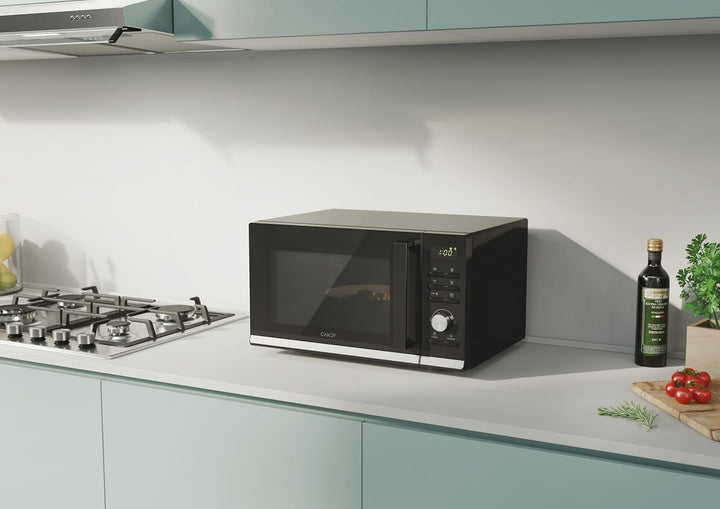 Candy Mikrowelle / 900 Watt/Grill 1000 Watt / 25 Liter/Grilleinsatz/Schwarz/Modell: CMGA25TNDB