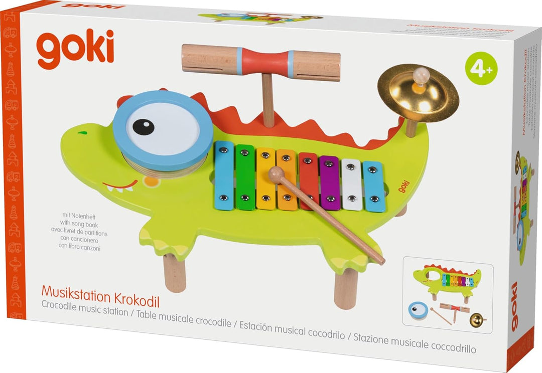 goki 61854 - Musikstation Krokodil aus Holz und Metall, Bunte Instrumente wie Xylophone und Becken,