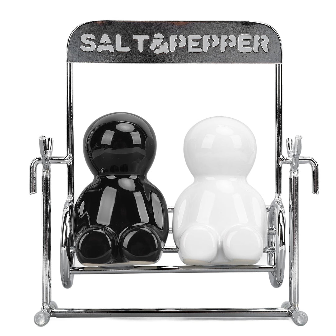 2 Stück Salz und Pfeffer Spender, Schwarz-Weiss Pfeffer- und Salzstreuer-Set mit Schwingfiguren Nied