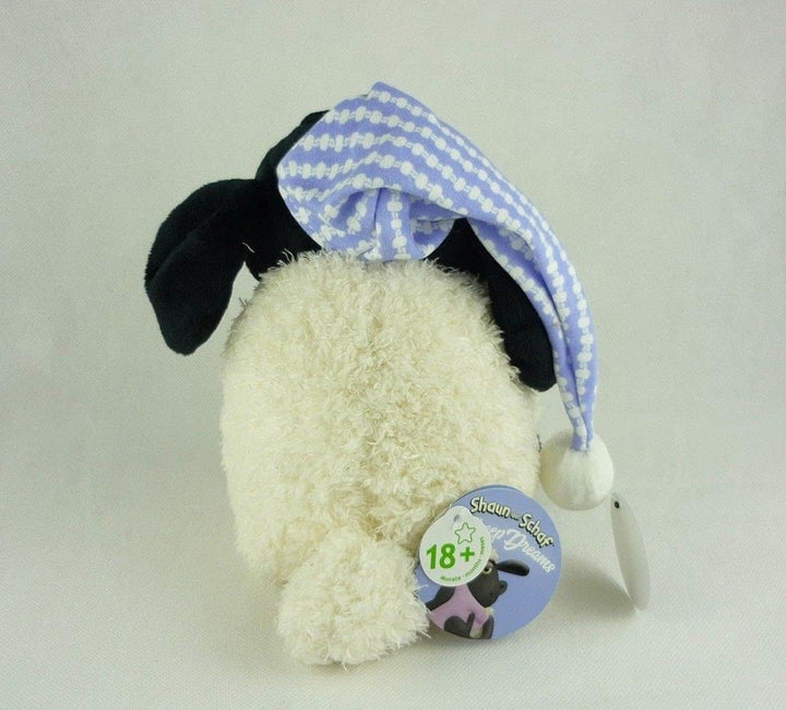 Shaun das Schaf Kuscheltier Timmy mit kleinem Bär, Schnuller und Schlafmütze, 25 cm, Farbe: Weiss/Sc