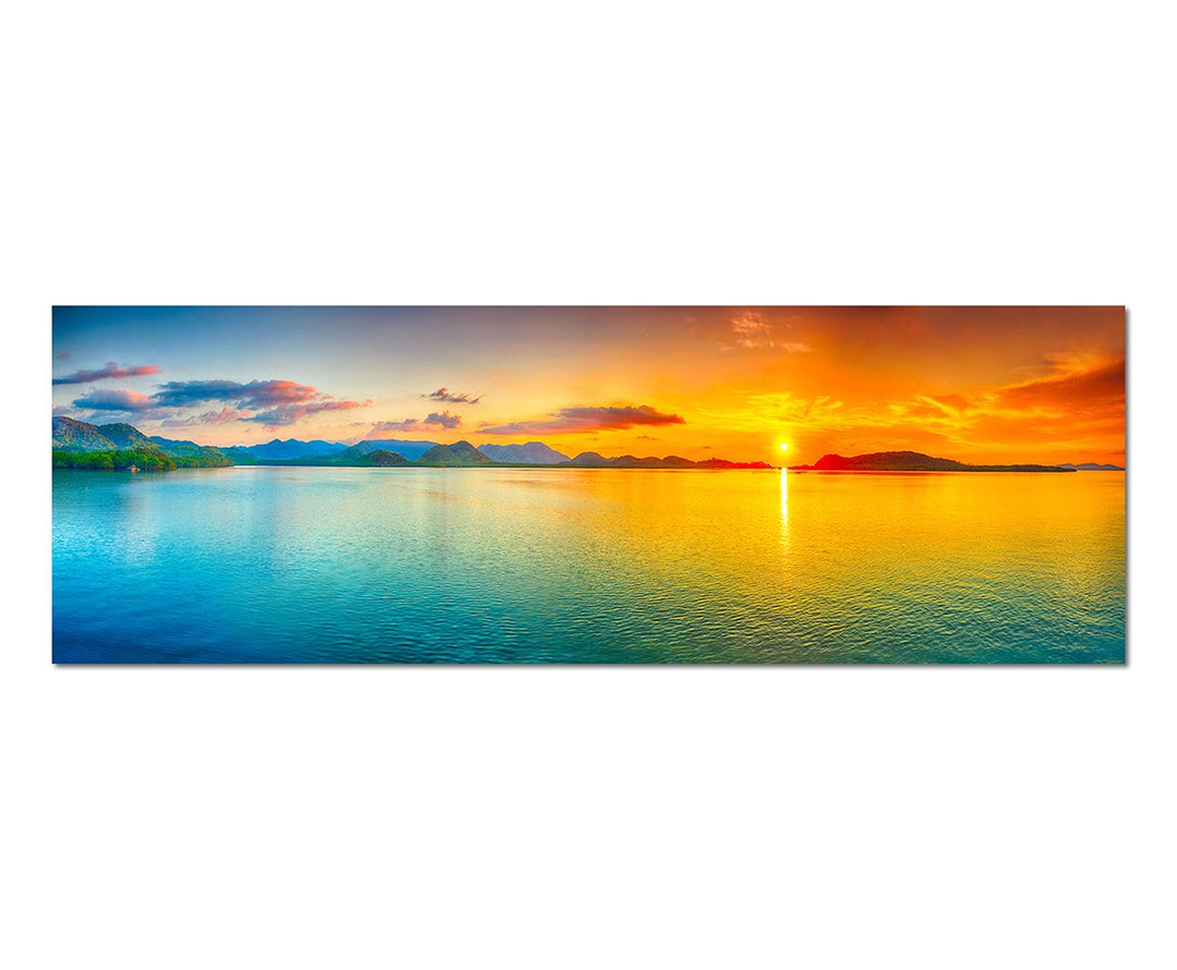 Paul Sinus Art Panoramabild auf Leinwand und Keilrahmen 150x50cm Meer Hügel Sonnenaufgang Wolkenschl
