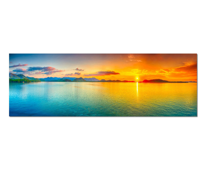 Paul Sinus Art Panoramabild auf Leinwand und Keilrahmen 150x50cm Meer Hügel Sonnenaufgang Wolkenschl