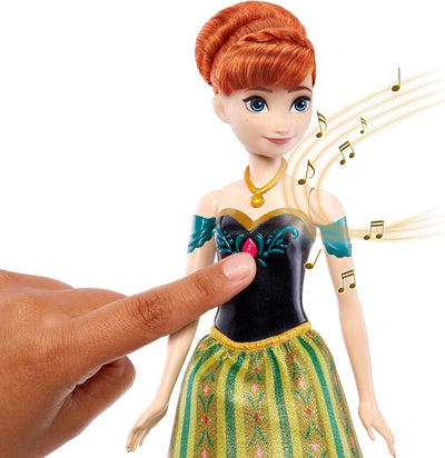 Disney Frozen Disney "Die Eiskönigin" Spielzeug, Anna-Musikpuppe in charakteristischer Kleidung, spi