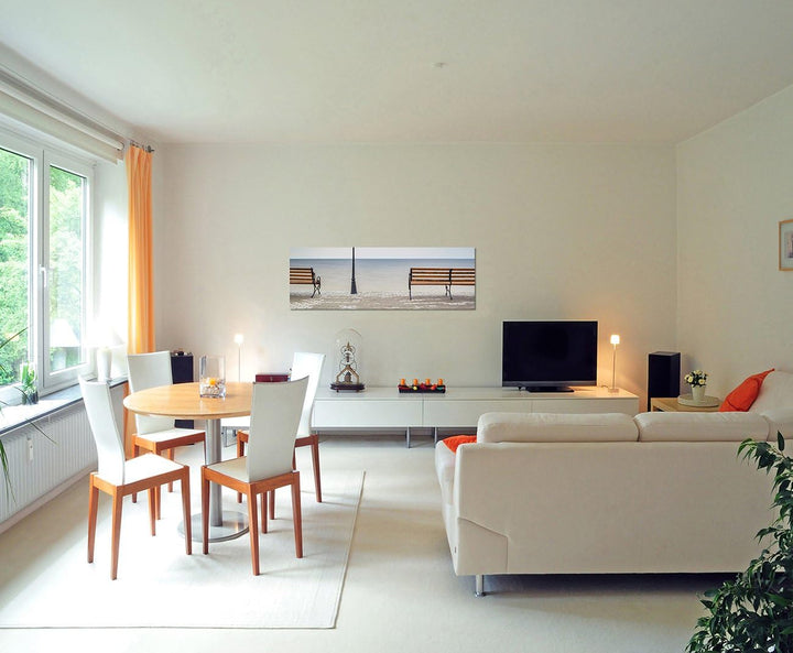 Paul Sinus Art Panoramabild auf Leinwand und Keilrahmen 150x50cm Meer Bänke Laterne Herbst