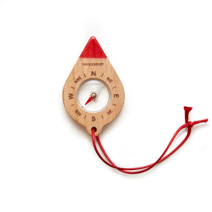 Huckleberry Compass: Mobilier FSC-Holzkompass, Literaturbeilage