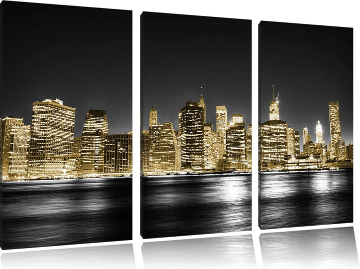 Manhattan Skyline bei Nacht schwarz/weiss 3-Teiler Leinwandbild 120x80 Bild auf Leinwand, XXL riesig