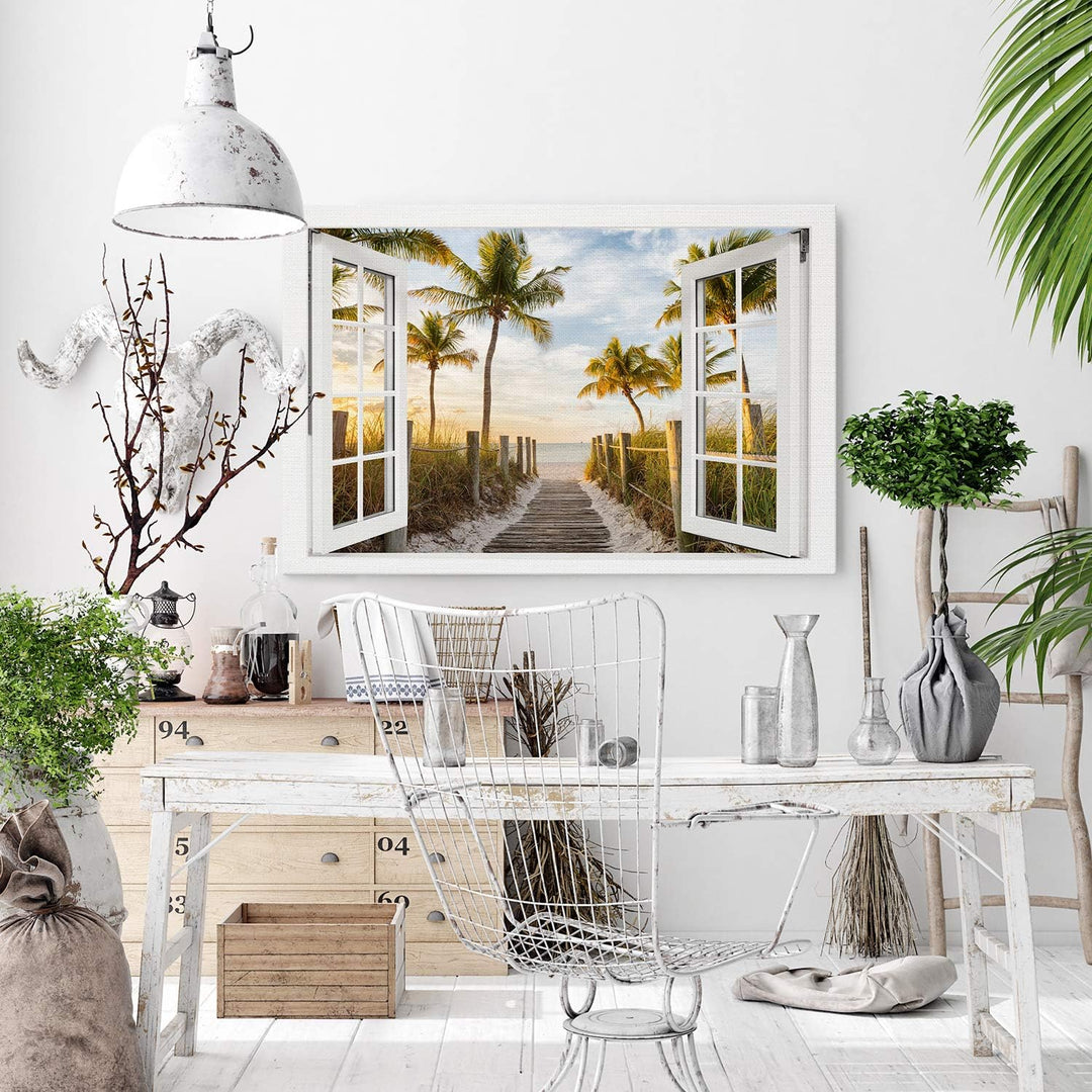 PICANOVA – Bild auf Leinwand Palmenweg zum Meer Fenster 120x80cm – Leinwandbild – Premium Leinwanddr