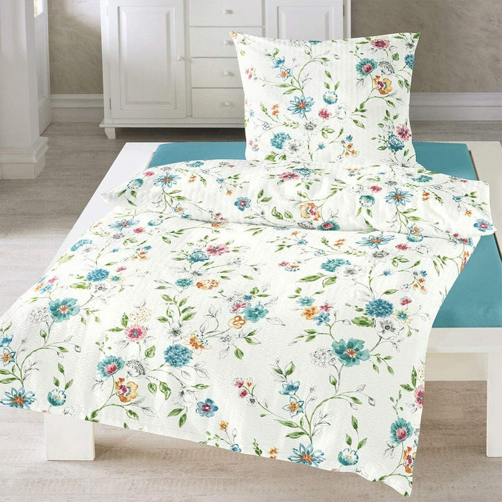 TRAUMSCHLAF Seersucker Bettwäsche Blumengirlande • Florales Design in Blau-Weiss • 100% Baumwolle •