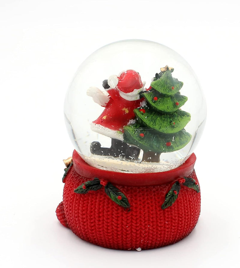 Dekohelden24 Schneekugel Weihnachtsmann mit Tannenbaum auf aufwendig verziertem Sockel, Masse L/B/H: