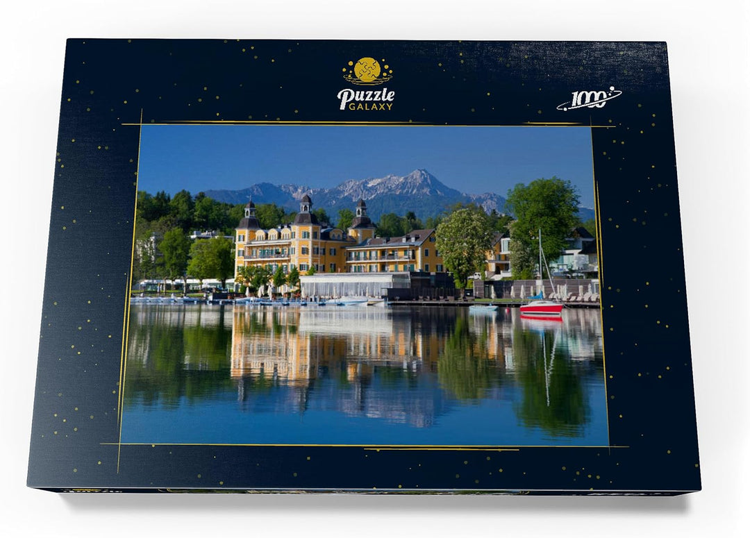 Schlosshotel am See gegen Mittagskogel (2143m), Velden, Wörther See, Österreich - Premium 1000 Teile