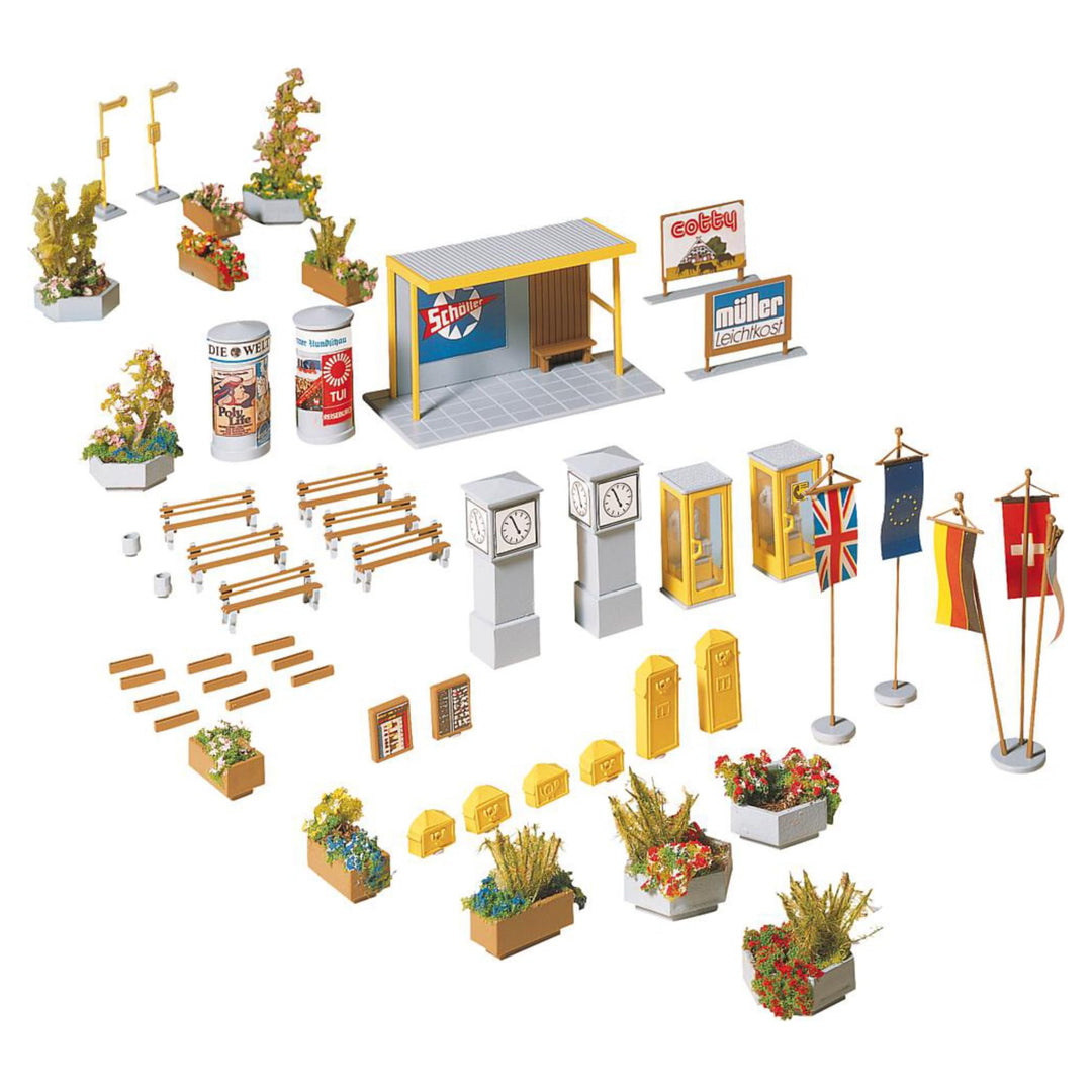 FALLER Stadtausschmückung Modellbausatz mit 117 Einzelteilen I Modelleisenbahn Zubehör H0 I Modellei