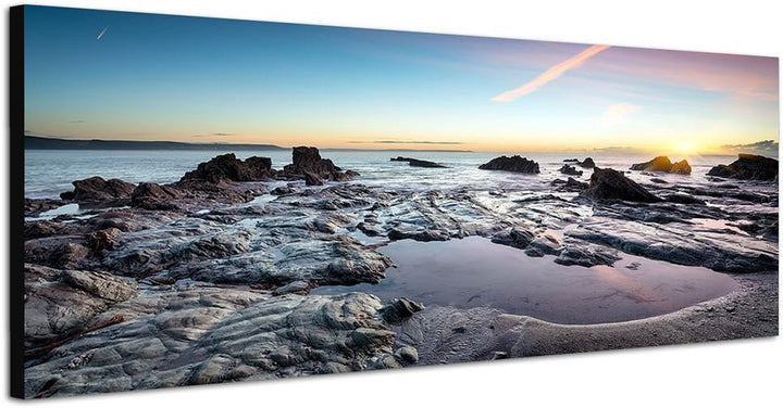 Paul Sinus Art Panoramabild auf Leinwand und Keilrahmen 150x50cm Cornwall Steinbecken Meer Sonnenunt