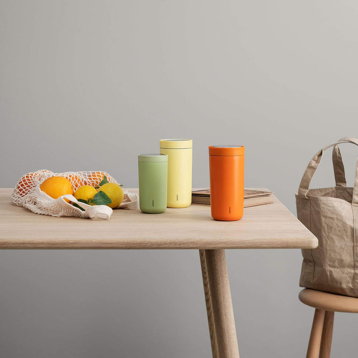 Stelton To-Go Click d. Kaffeemühlen steel, 0.4 l. - soft yellow