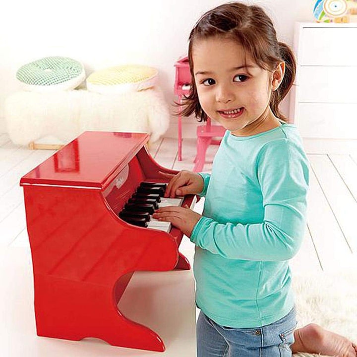 Hape Spielzeug-Klavier | Mit 18 Tasten, Musikinstrument für Kinder aus Holz, Rot