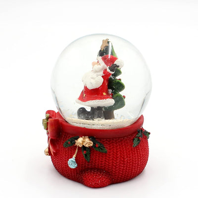 Dekohelden24 Schneekugel Weihnachtsmann mit Tannenbaum auf aufwendig verziertem Sockel, Masse L/B/H: