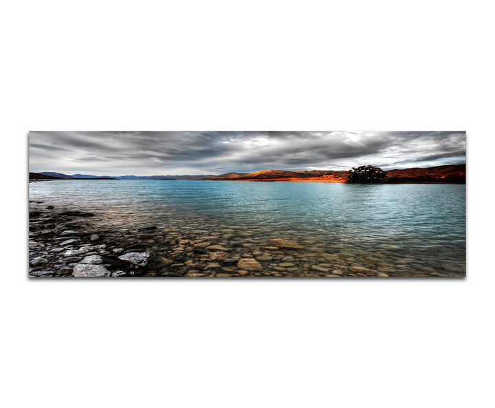 Paul Sinus Art Panoramabild auf Leinwand und Keilrahmen 150x50cm Bergsee Berge Steine Wolkenhimmel
