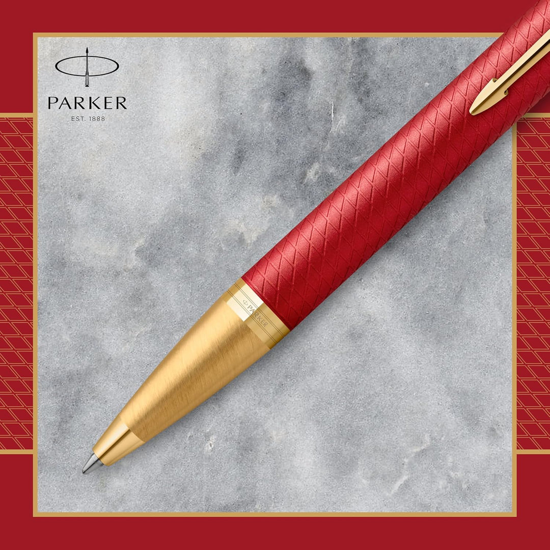 Parker IM Kugelschreiber, rote Premiumlackierung mit goldenen Zierteilen, mittlere Schreibspitze mit
