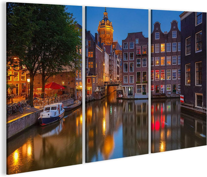 islandburner, Bild auf Leinwand Nachtansicht von Nicolaaskerk in Amsterdam Wandbild Poster Leinwandb