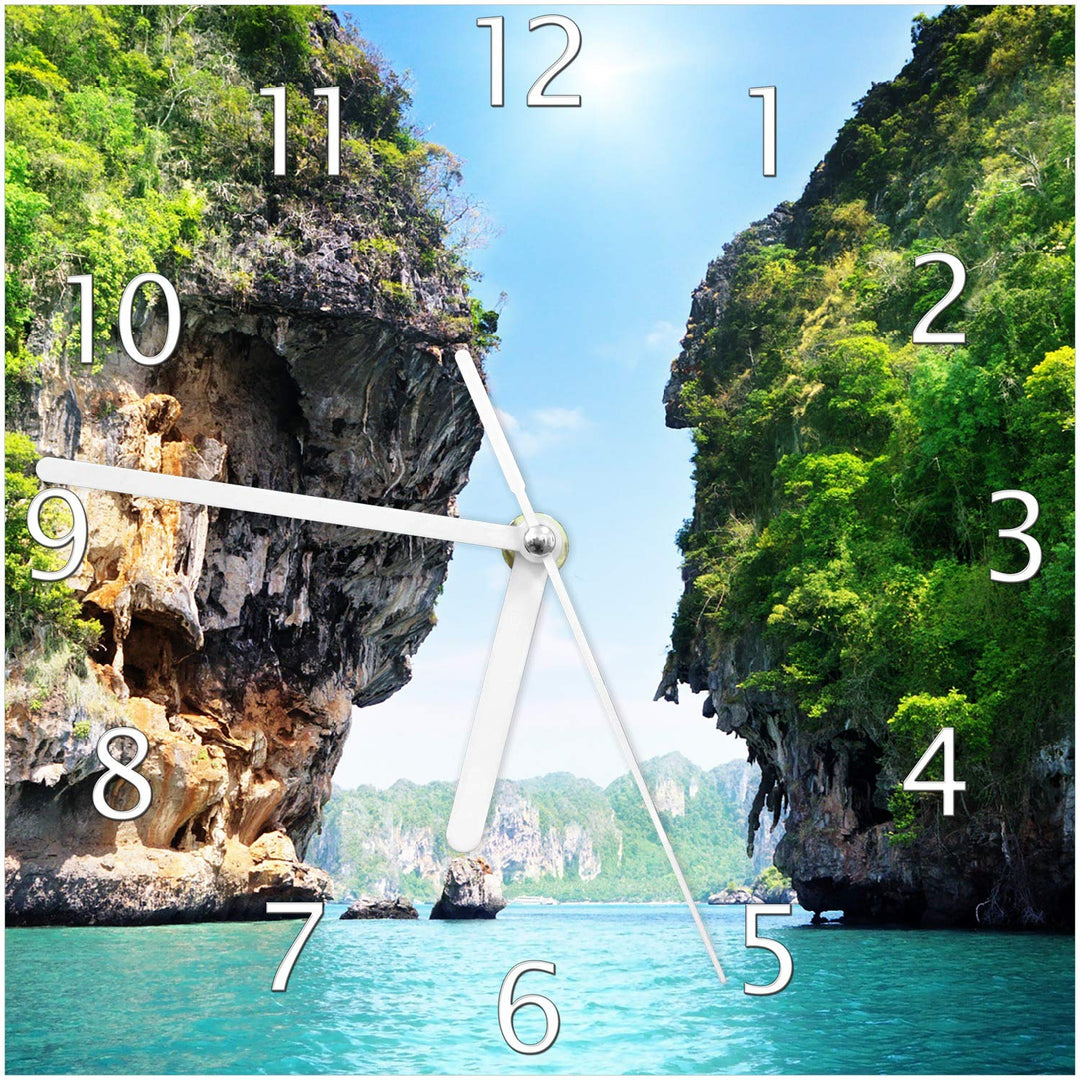 Wallario Design-Wanduhr Felsenschlucht am Meer in Thailand aus Glas, Motiv-Uhr Grösse 20 x 20 cm, we