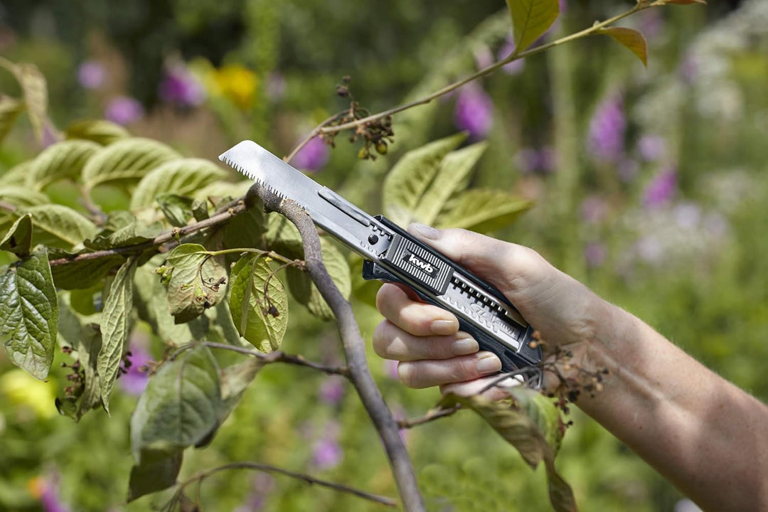 KWB Cuttermesser mit Japansäge 17118 (Autolock-Funktion, auch für handelsübliche 18 mm Klingen, Edel