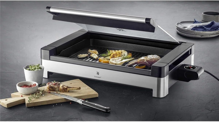 WMF Lono Elektro Tischgrill mit Glasdeckel, beschichtete Grillplatte, 2200 Watt, edelstahl matt