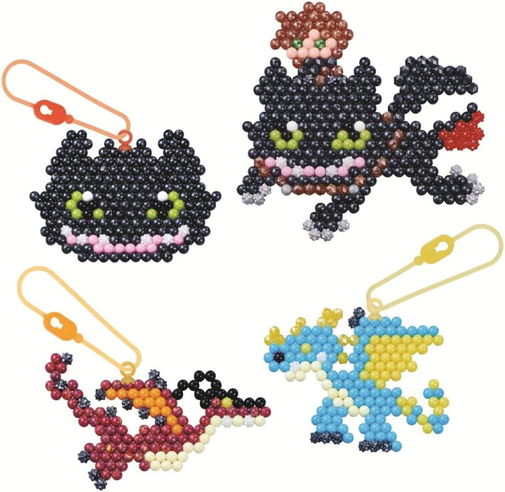 Aquabeads - 35124 Dragons Schlüsselanhänger Bastelset, Wasserperlen Bastelset mit Hicks, Ohnezahn, f