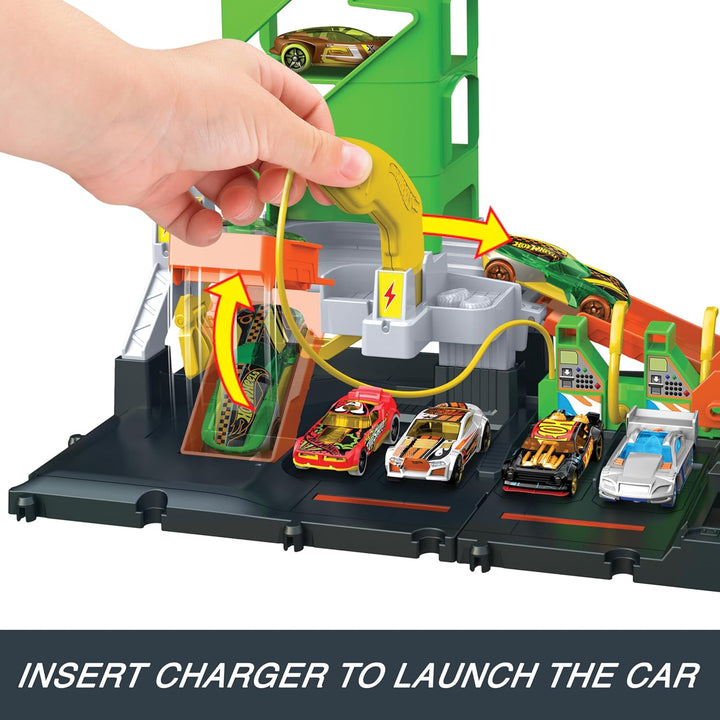 Hot Wheels Let's Race Netflix - City Superladung Tankstelle-Spielset mit Ladestationen für Elektrofa