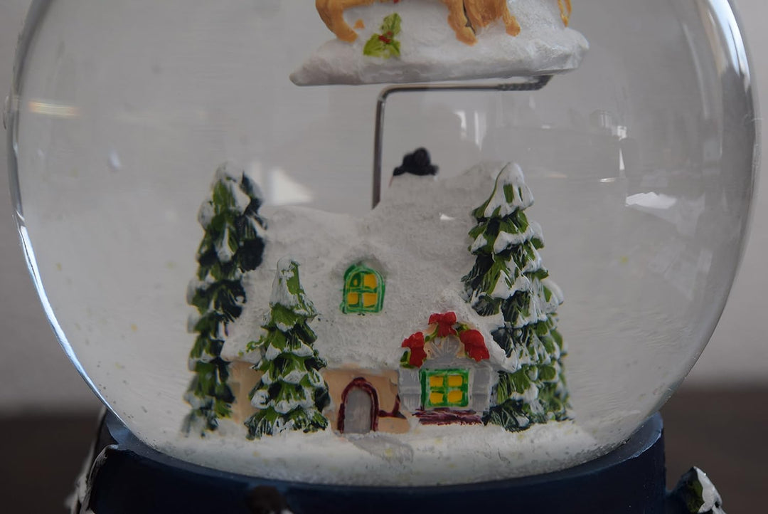 Dekohelden24 XXL Schneekugel mit Rotierung, Schneewirbel und Sound, Masse H/B/Ø Kugel: ca. 19,5 x 13