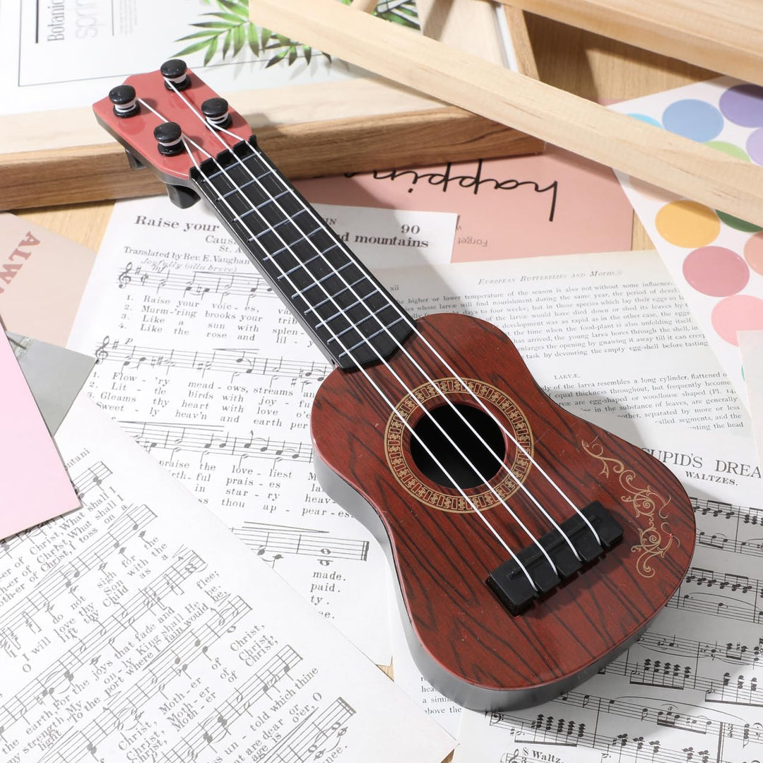 SAFIGLE Musikgitarrenspielzeug Für Kinder Ukulele Klassisches 4-Saiter-Instrument Mini-Kindergitarre