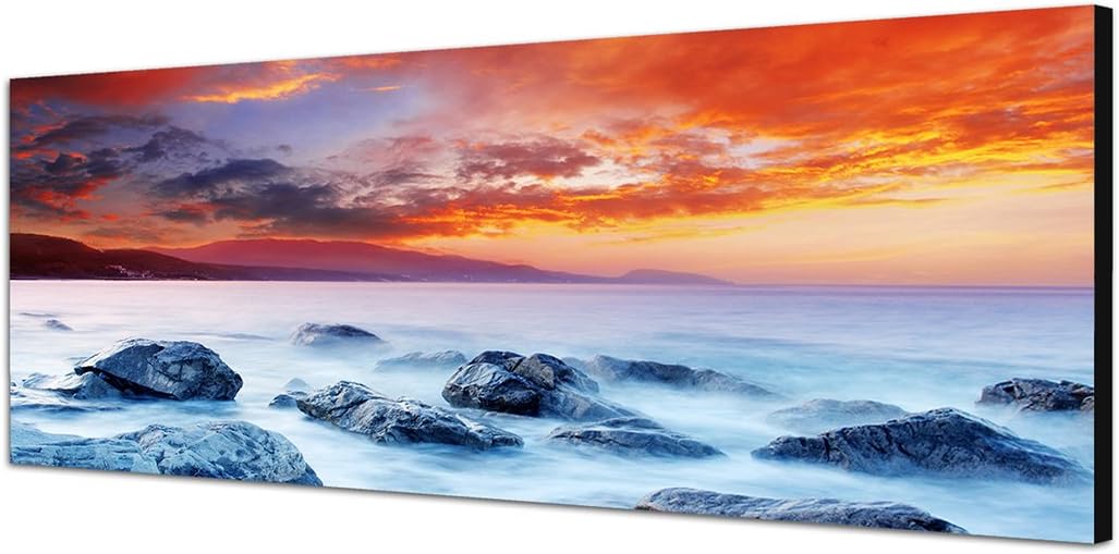 Paul Sinus Art Panoramabild auf Leinwand und Keilrahmen 150x50cm Meer Dunst Sonnenuntergang Steine