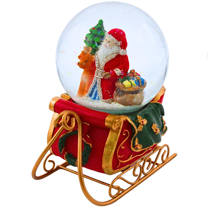 Dekohelden24 Hochwertige Schneekugel Weihnachtsmann auf Schlitten, aufwendig dekorierter Sockel als
