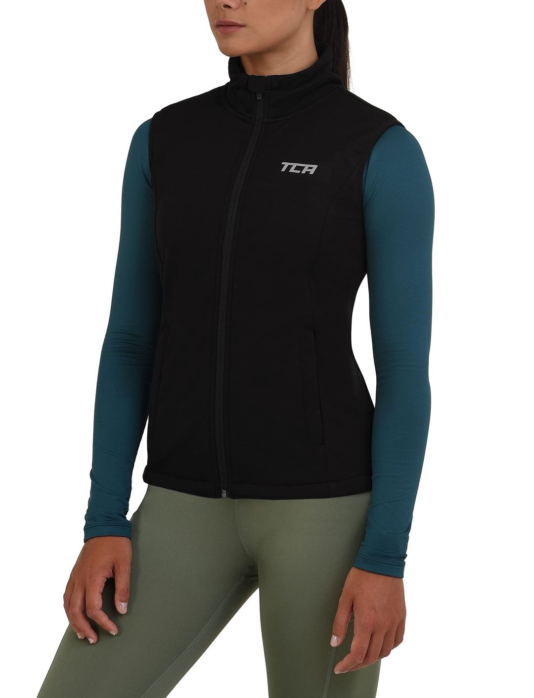 TCA Damen Flyweight winddichte Lauf- und Fahrradweste mit Reissverschlusstaschen, XS Schwarz