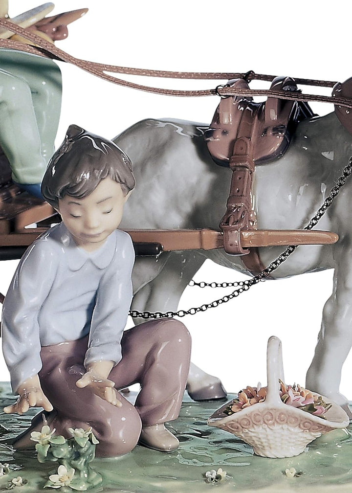 LLADRÓ Kinder-Skulptur Fröhliche Spazierfahrt. Limitierte Auflage. Kind. Porzellan.