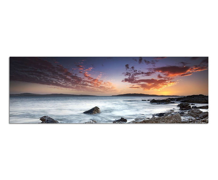 Paul Sinus Art Panoramabild auf Leinwand und Keilrahmen 150x50cm Meer Steine Felsen Abendhimmel