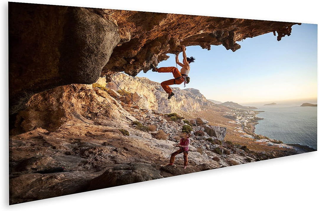 islandburner Bild auf Leinwand Junge Frau Klettert An Höhlenwand Am Meer Bilder Wandbilder Poster Le