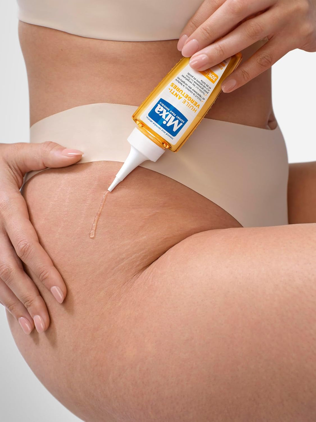 Mixa - Körperöl gegen Dehnungsstreifen - 30% Omega-6 & 9 - Reduziert Farbe, Textur und Dicke von Deh